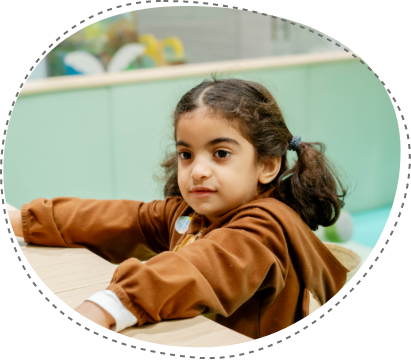 Child relaxing in soft play area at Piccoli indoor activity center.